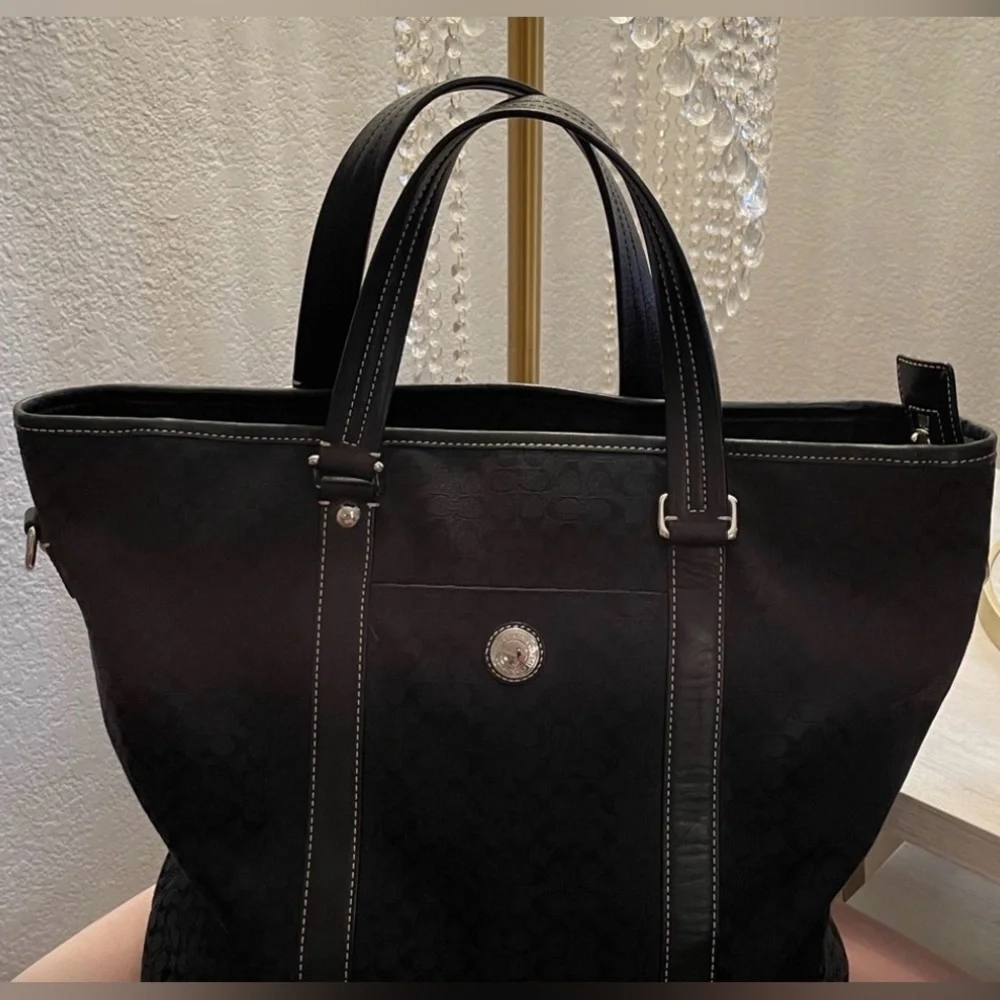 Coach travel Signature tote black featuring monogram canvas and leather 2009